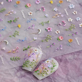 PowPop daisy flower nail stickers add delicate charm and quick elegance to any manicure.