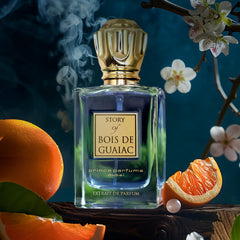 Close-up of Bois de Guaiac bottle showing exotic woods and amber warmth
