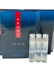 Prada Ocean Luna Rossa mini vials close-up showing versatile layering possibilities.