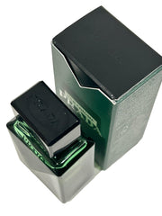 Prada Paradigme EDP Men mini bottle close-up, premium design for pocket carry.
