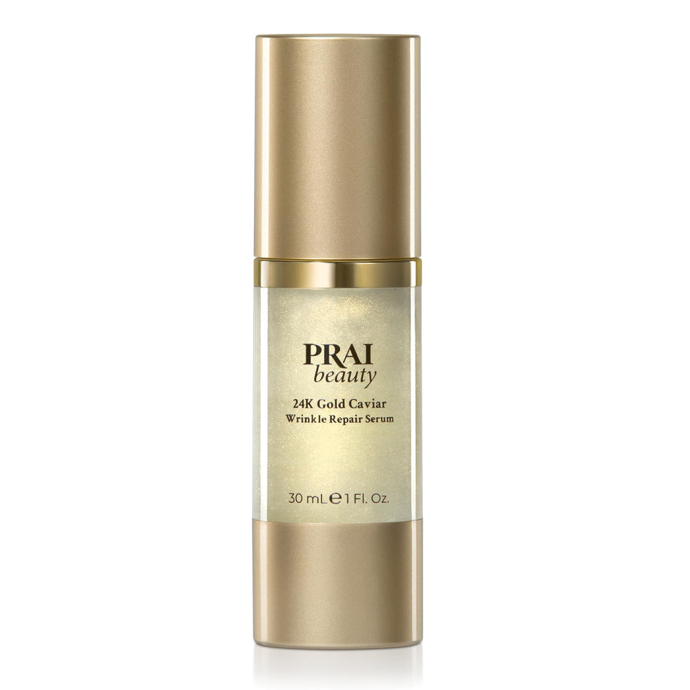 PRAI Beauty 24K Gold Caviar Serum bottle showcasing premium anti-aging care.