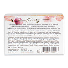 Texture of the exfoliant with sugar and almond shell particles.