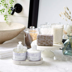 Lavender cap on Pre de Provence lotion offers a travel-friendly care option.