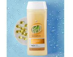 Close-up of Prell Shampoo label featuring hyaluronic acid and biotin