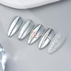 PrettyDiva silver mirror finish nails showcase a bold reflective chrome effect.