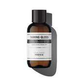 PREVIA Anti-Frizz Gloss bottle offers silky hydration and frizz control.