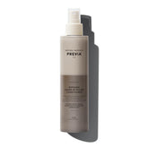 PREVIA hydrating biphasic leave-in spray bottle ready for detangling and frizz control