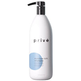 Prive Moisture Rich Shampoo bottle showcases hydration for dry, frizz-prone hair.