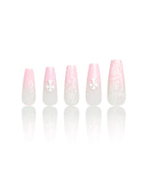 PSYTONE short almond nails with light pink French tip for at-home salon-like manicure.