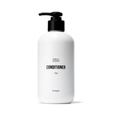 Public Goods Condicionador: botella visible, cabello suave y protegido.