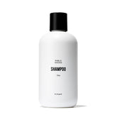 Public Goods shampoo bottle front highlighting gentle cleansing with organic oils.
