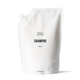 Public Goods Shampoo bottle with natural essential oils for gentle cleansing.