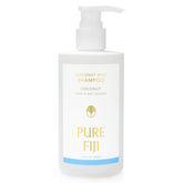 Pure Fiji Coconut Milk Shampoo bottle on shelf, delivering gentle cleansing for daily hair care.