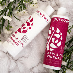 Purezero hair care routine bathroom scene implying hydration and healthy-looking tresses.