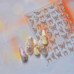 Qdsuh pink bow sticker adds charming accents to nails and crafts.