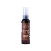 Qhemet Biologics Coconut & Green Tea Serum bottle offering lightweight hydration for dry hair.