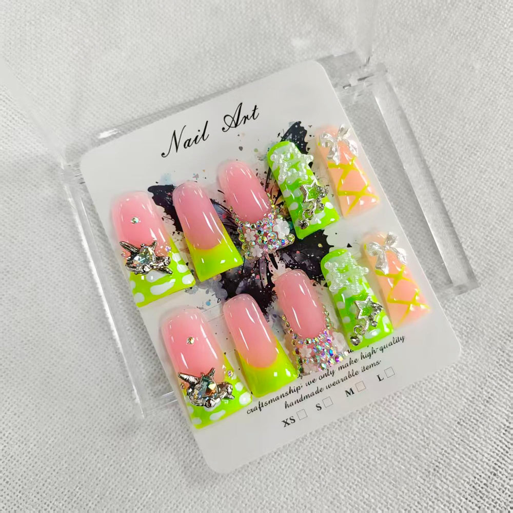 Qicaijia luxury press-on nails in long duck design with a glossy green finish, ideal for at-home manicures