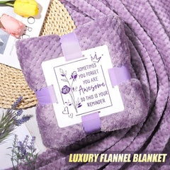 Qinline soft flannel blanket inviting cozy warmth for evenings at home.