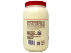 Queen Helene Cholesterol Hair Conditioning Cream label close-up showing nourishing blend.