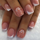 Quezadyl rose gold glitter French tips for quick at-home glam.