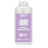 QYF eyelash extension shampoo bottle lavender scent for gentle cleansing.
