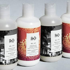 R+Co Bel Air smoothing conditioner bottle highlights added body and shine.