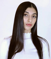 R+Co Bel Air hair shine close-up showing silky, glossy strands.