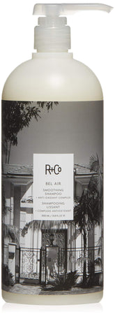 R+Co Bel Air smoothing shampoo bottle for a luxe cleansing experience and silky hair.