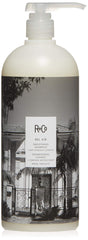 R+Co Bel Air smoothing shampoo bottle for a luxe cleansing experience and silky hair.