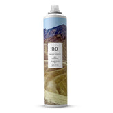 R+Co Death Valley dry shampoo bottle shows volume boost for refreshed roots and lift.