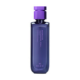 R+Co Magnifier thickening spray bottle for volumized hair throughout the day.