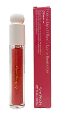 Rare Beauty Glimmer pour les lèvres — bouteille lumineuse et reflets rose doré, hydratation rapide.