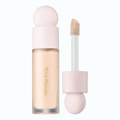 Rare Beauty Liquid Touch Brightening Concealer 140C bottle delivering a light, skin-like brightening finish.