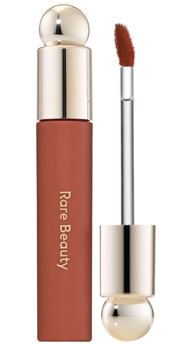 Rare Beauty Soft Pinch Lip Oil Honesty bottle pour reveals nude-brown tint for effortless daily wear