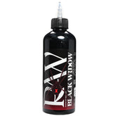 Raw Black Widow tattoo ink bottle closeup with rich deep black pigment for bold lines.