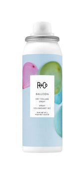 R+Co Balloon dry volume spray travel bottle closeup showing instant lift and texture.