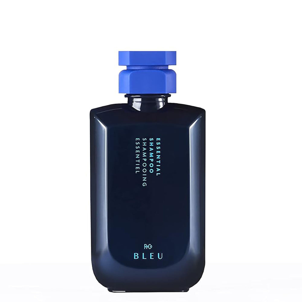 R+Co BLEU Essential Shampoo bottle front highlighting hydration and shine.