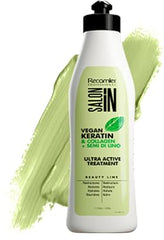 RECAMIER bottle closeup reveals flax seed formula enhancing shine and vitality.