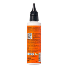 Red by Kiss Growth MD ingredients close-up, showing organic oils for nourishment.