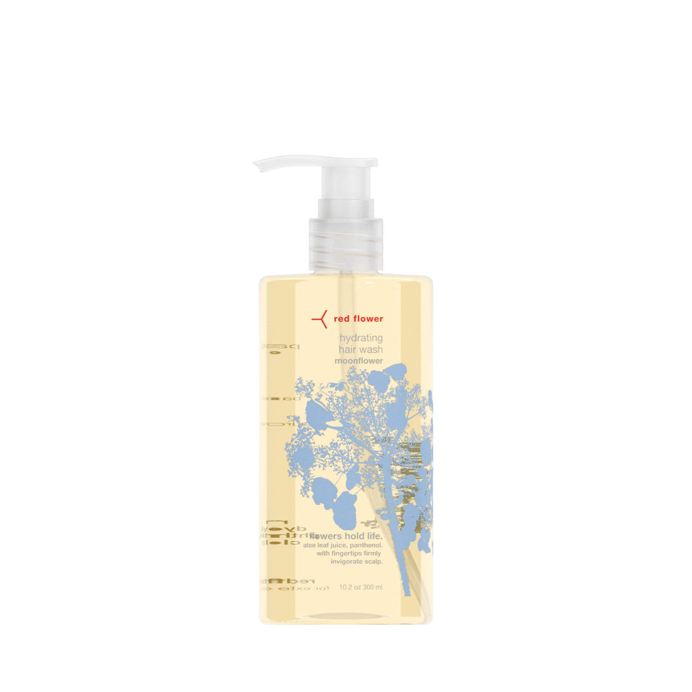 Red Flower Moonflower Hydrating Hair Wash bottle pour highlighting moisture-rich formula for all hair types