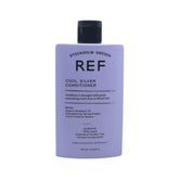 REF Cool Silver Conditioner bottle pour showing violet pigments to neutralize yellow tones.