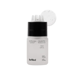 Refilled Booster Plus Moisture bottle pour for easy, mess-free scalp application.