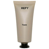 REFY Body Glow Highlighting Serum bottle pour for hydrating radiance.