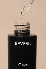 REVERIE Cake Restorative Scalp Tonic dropper application enabling precise scalp nourishment