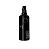 REVERIE Natural Milk anti-frizz bottle closeup shows frizz control.