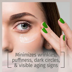 Close-up of the Reviva Labs eye serum dropper applying formula to the orbital area.