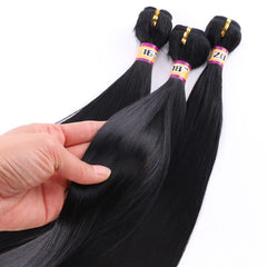 REYNA 18-inch silky straight weft close-up highlighting smooth texture and easy blending.