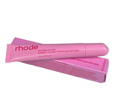 Rhode Peptide Lip Tint Jelly Bean swatch showing sheer color with a glossy shine.
