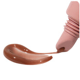 Rhode peptide lip tint sheer color swatch for a dewy, hydrating look.