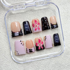 RIICFDD duck press-on nails show 3D flower art with gold pearl accent for elegance